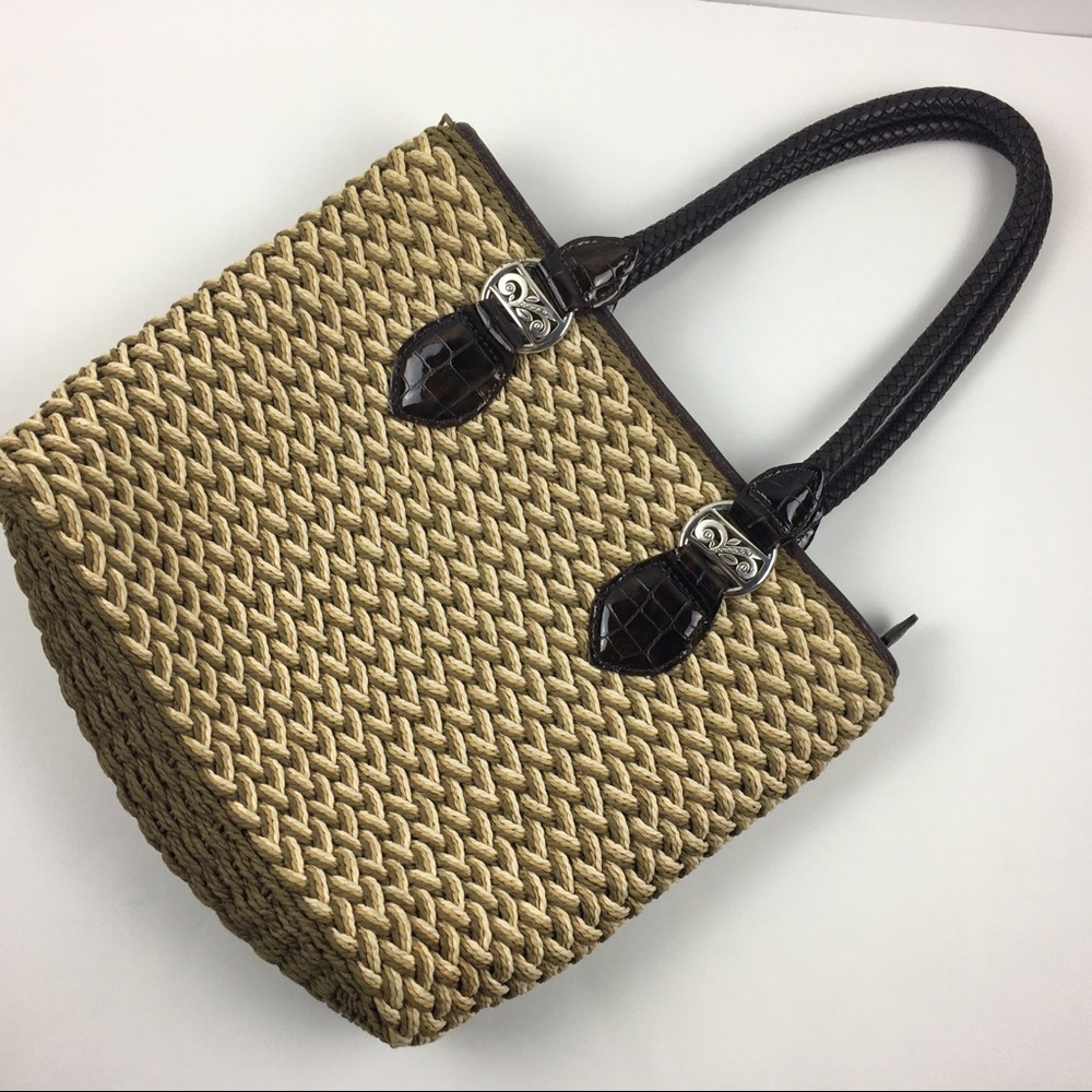 Brighton straw tote bag with zippered top.